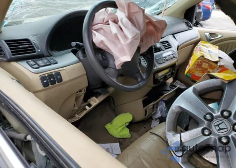 2009 Honda Odyssey Touring z USA, uszkodzony, nr VIN 5FNRL38939B040025